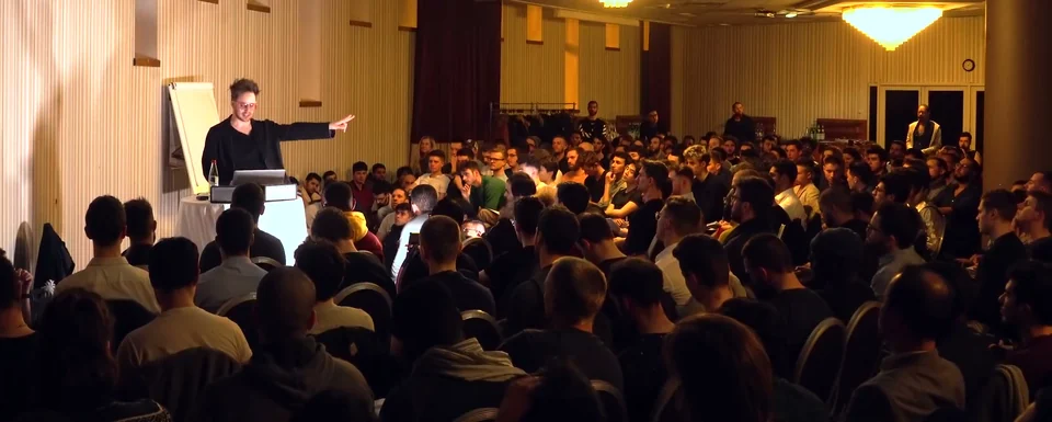 Julien Blanc teaching a live audience